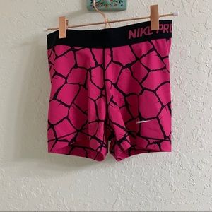 Pink Nike Pro shorts